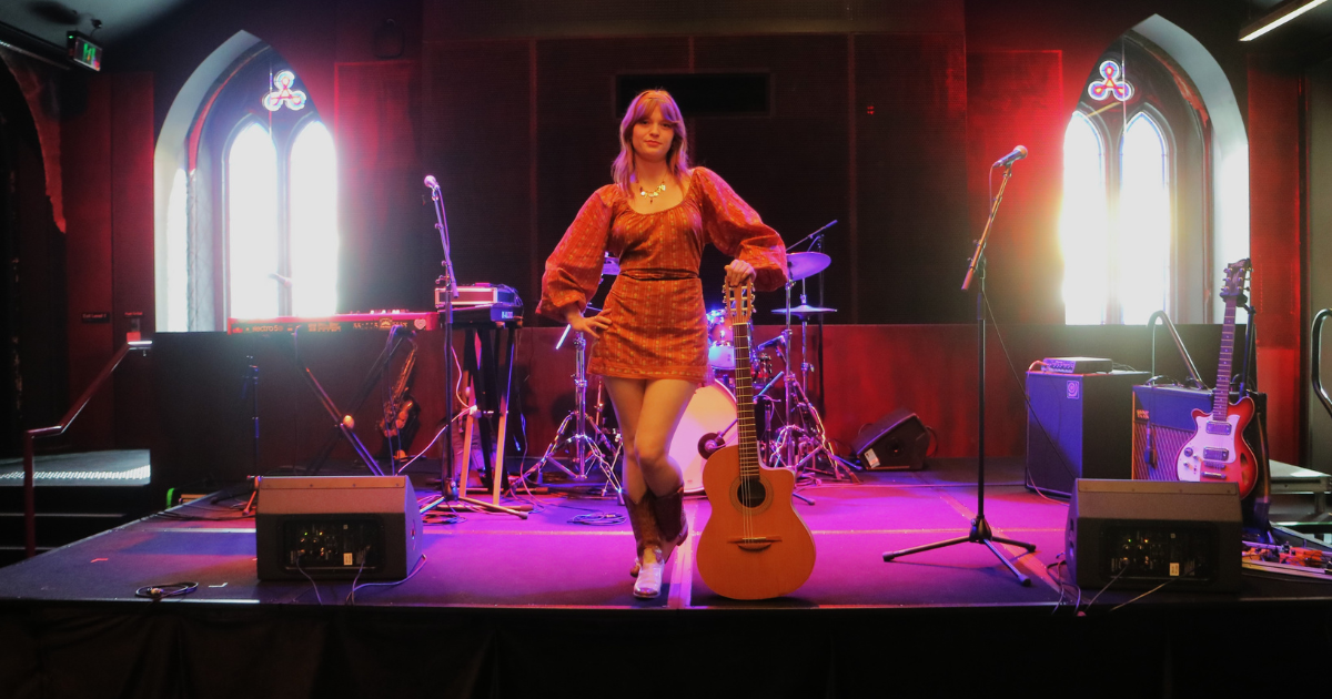 Musician Daisy Kilbourne on Stage at Church