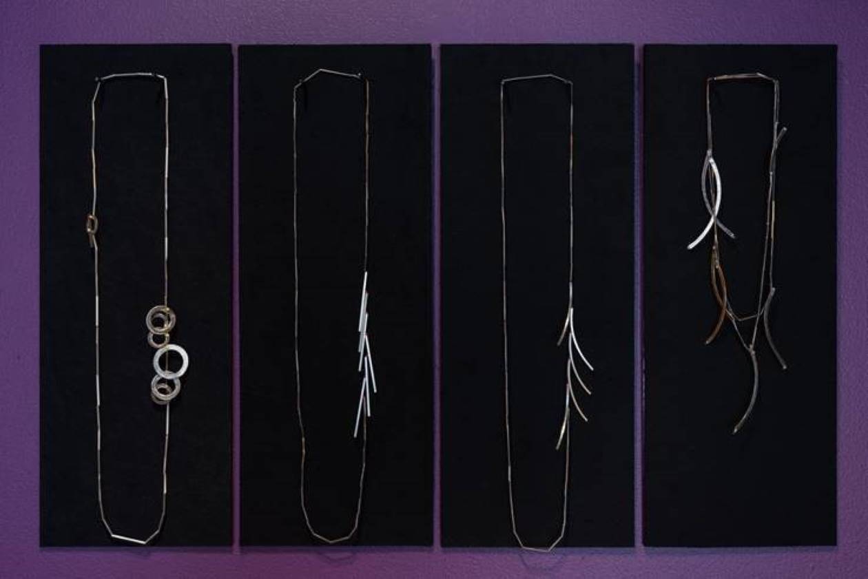 handmark exhibition necklace black wall